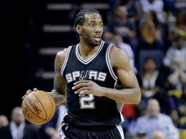MEMPHIS, TN - APRIL 22: Kawhi Leonard #2 of the San Antonio Spurs dribbles the ball against the Memphis Grizzlies in game four of the Western Conference Quarterfinals during the 2017 NBA Playoffs at FedExForum on April 22, 2017 in Memphis, Tennessee.