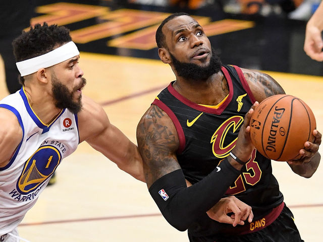 CLEVELAND, OH - JUNE 08: LeBron James #23 of the Cleveland Cavaliers attempts a layup over JaVale McGee #1 of the Golden State Warriors in the first half during Game Four of the 2018 NBA Finals at Quicken Loans Arena on June 8, 2018 in Cleveland, Ohio.