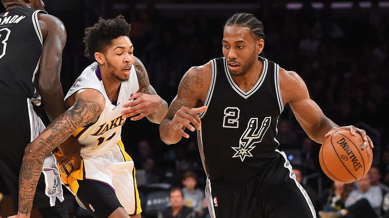 LOS ANGELES, CA - FEBRUARY 26: Kawhi Leonard #2 of the San Antonio Spurs drives to the basket as he gets past Brandon Ingram #14 of the Los Angeles Lakers in the second half of the game at Staples Center on February 26, 2017 in Los Angeles, California. Spurs won 119-98.