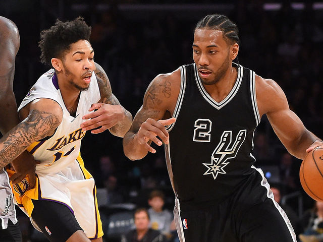 LOS ANGELES, CA - FEBRUARY 26: Kawhi Leonard #2 of the San Antonio Spurs drives to the basket as he gets past Brandon Ingram #14 of the Los Angeles Lakers in the second half of the game at Staples Center on February 26, 2017 in Los Angeles, California. Spurs won 119-98.