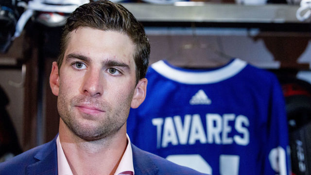 TORONTO, ON - JULY 1 - John Tavares speaks to the media in the Leafs dressing room. The Toronto Maple Leafs have signed John Tavares for seven years, $77 million. July 1, 2018. (Carlos Osorio/Toronto Star via Getty Images)