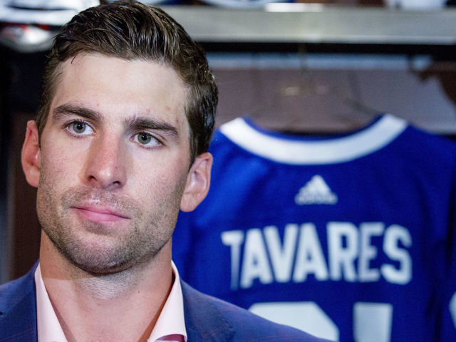 TORONTO, ON - JULY 1 - John Tavares speaks to the media in the Leafs dressing room. The Toronto Maple Leafs have signed John Tavares for seven years, $77 million. July 1, 2018. (Carlos Osorio/Toronto Star via Getty Images)