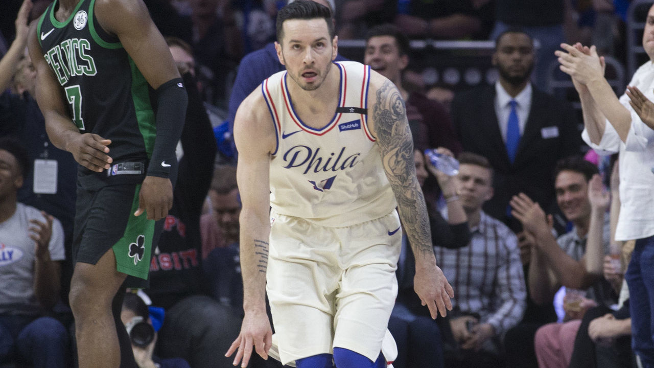 PHILADELPHIA, PA - MAY 5: JJ Redick #17 of the Philadelphia 76ers reacts in front of Jaylen Brown #7 of the Boston Celtics after making a three point basket in the first quarter during Game Three of the Eastern Conference Second Round of the 2018 NBA Playoff at Wells Fargo Center on May 5, 2018 in Philadelphia, Pennsylvania.