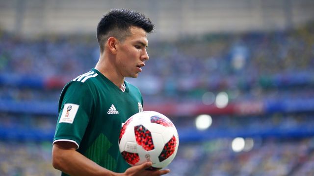 Mexico's forward Hirving Lozano holds the ball during the Russia 2018 World Cup round of 16 football match between Brazil and Mexico at the Samara Arena in Samara on July 2, 2018.