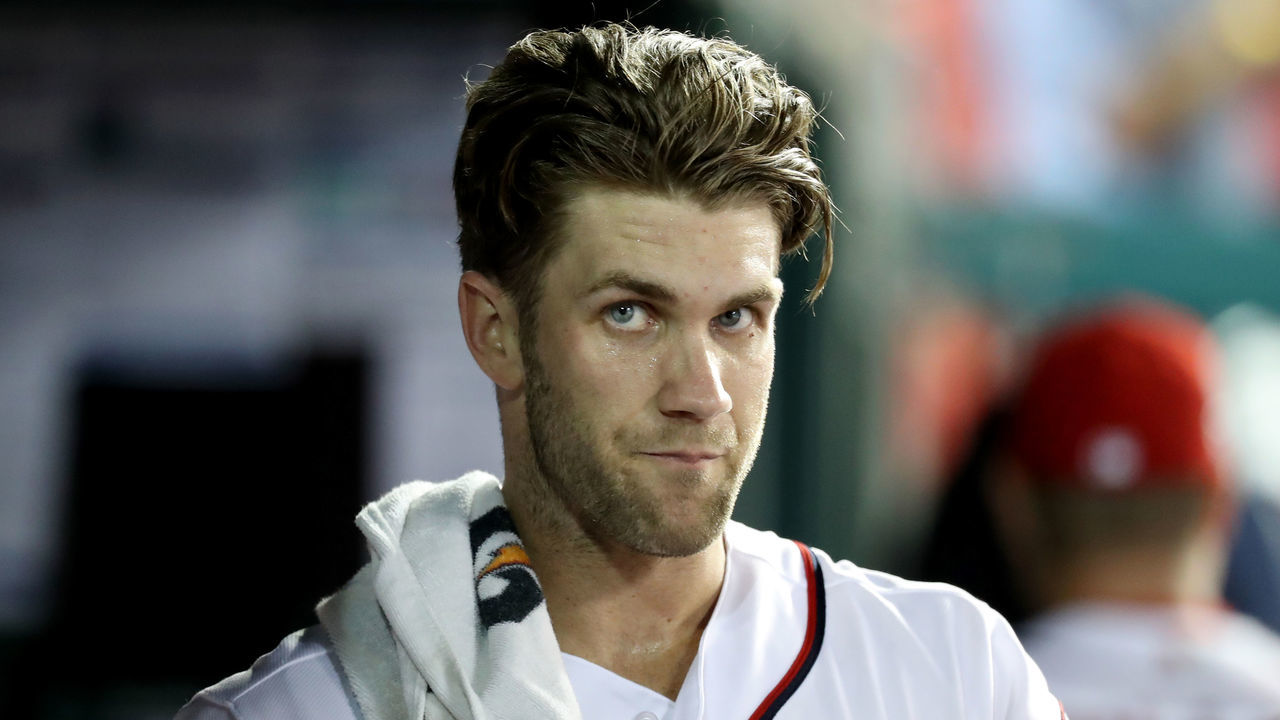 WASHINGTON, DC - JUNE 21: Bryce Harper #34 of the Washington Nationals looks on from the dugout against the Baltimore Orioles at Nationals Park on June 21, 2018 in Washington, DC.