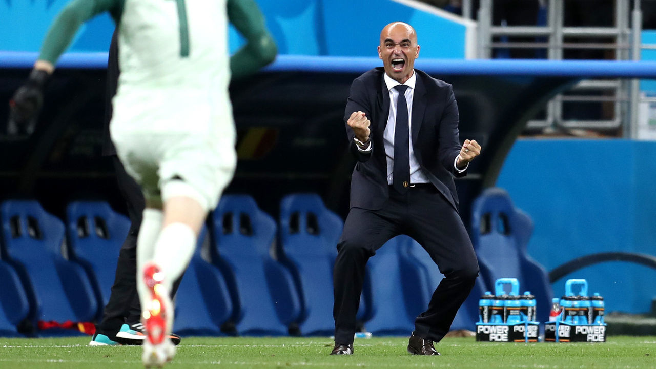 ROSTOV-ON-DON, RUSSIA - JULY 02: Roberto Martinez, Head coach of Belgium and Thibaut Courtois of Belgium celebrate after their sides third goal during the 2018 FIFA World Cup Russia Round of 16 match between Belgium and Japan at Rostov Arena on July 2, 2018 in Rostov-on-Don, Russia.