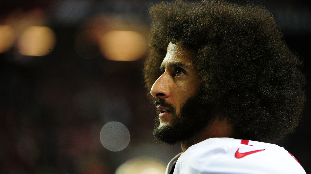 ATLANTA, GA - DECEMBER 18: Colin Kaepernick #7 of the San Francisco 49ers looks on from the sidelines during the second half against the Atlanta Falcons at the Georgia Dome on December 18, 2016 in Atlanta, Georgia.
