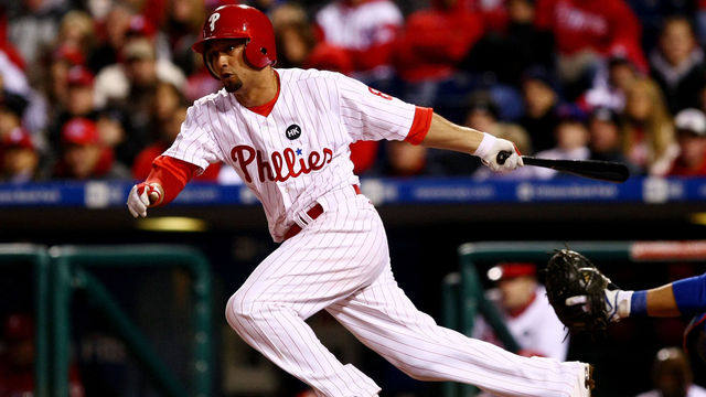 PHILADELPHIA - OCTOBER 19: Shane Victorino #8 of the Philadelphia Phillies hits a triple in the bottom of the sixth inning against the Los Angeles Dodgers in Game Four of the NLCS during the 2009 MLB Playoffs at Citizens Bank Park on October 19, 2009 in Philadelphia, Pennsylvania.