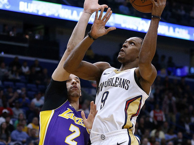 NEW ORLEANS, LA - MARCH 22: Rajon Rondo #9 of the New Orleans Pelicans shoots against Lonzo Ball #2 of the Los Angeles Lakers during the first half at the Smoothie King Center on March 22, 2018 in New Orleans, Louisiana.
