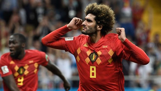 TOPSHOT - Belgium's midfielder Marouane Fellaini (R) celebrates after scoring the equaliser during the Russia 2018 World Cup round of 16 football match between Belgium and Japan at the Rostov Arena in Rostov-On-Don on July 2, 2018.
