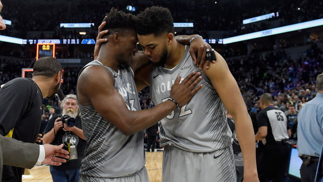 MINNEAPOLIS, MN - APRIL 11: Jimmy Butler #23 and Karl-Anthony Towns #32 of the Minnesota Timberwolves celebrate after winning the game against the Denver Nuggets on April 11, 2018 at the Target Center in Minneapolis, Minnesota. The Timberwolves defeated the Nuggets 112-106.