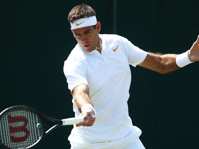 LONDON, ENGLAND - JULY 03: Juan Martin Del Potro of Argentina returns against Peter Gojowczyk of Germany during their Men's Singles first round match on day two of the Wimbledon Lawn Tennis Championships at All England Lawn Tennis and Croquet Club on July 3, 2018 in London, England.