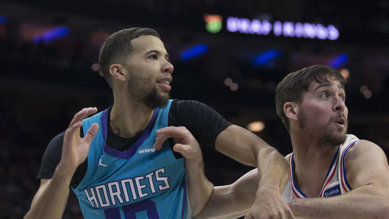 PHILADELPHIA, PA - MARCH 2: Michael Carter-Williams #10 of the Charlotte Hornets fights for position against T.J. McConnell #12 of the Philadelphia 76ers at the Wells Fargo Center on March 2, 2018 in Philadelphia, Pennsylvania. *** Local Caption *** Michael Carter-Williams;T.J. McConnell