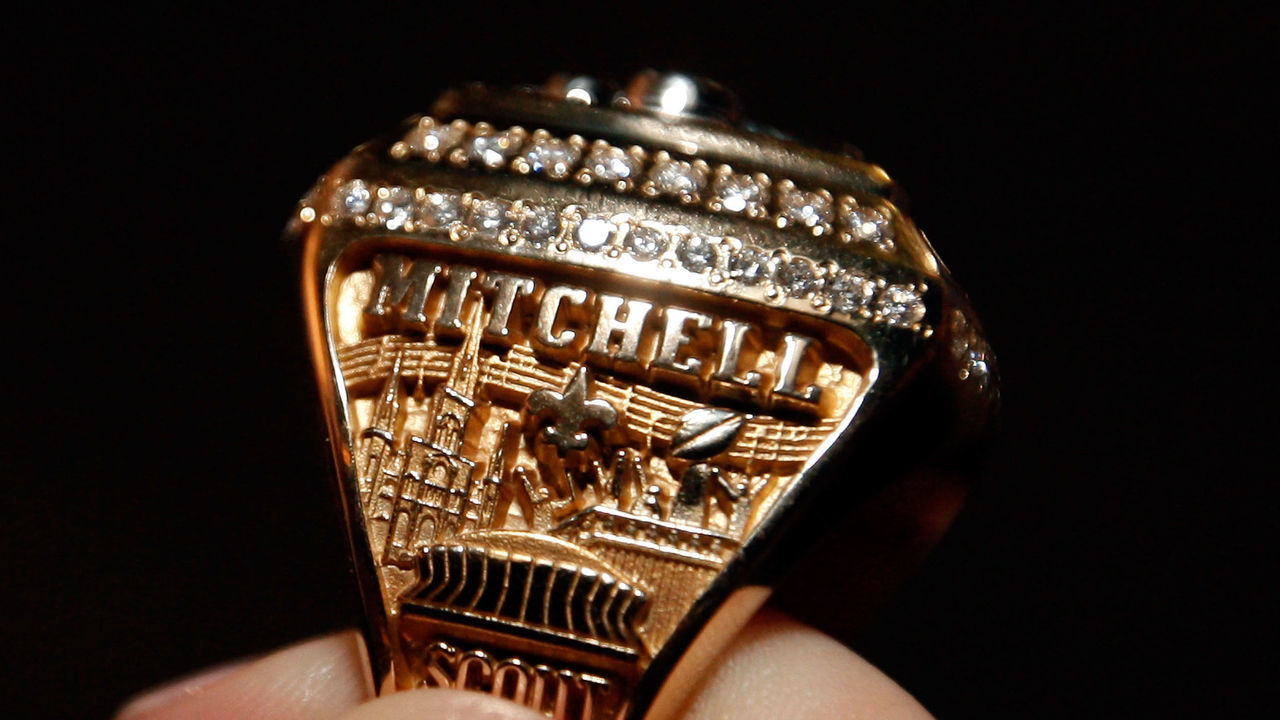 NEW ORLEANS - JUNE 16: A member of the New Orleans Saints shows off their ring from Super Bowl XLIV on June 16, 2010 in New Orleans, Louisiana.