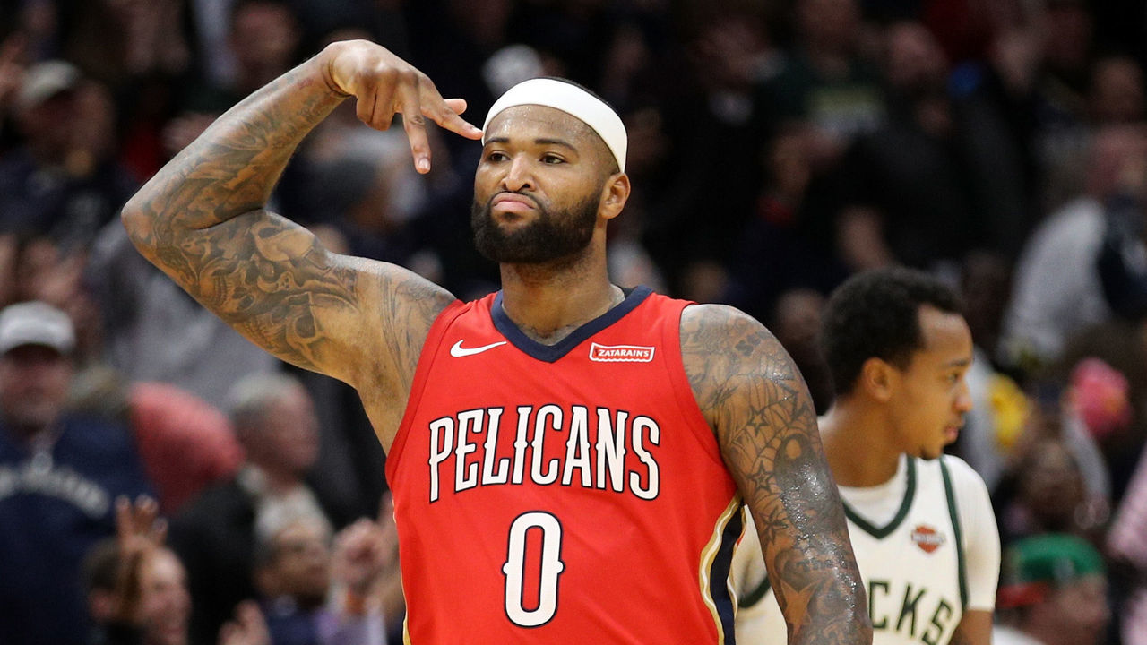 NEW ORLEANS, LA - DECEMBER 13: DeMarcus Cousins #0 of the New Orleans Pelicans reacts after a three point shot against the Milwaukee Bucks at Smoothie King Center on December 13, 2017 in New Orleans, Louisiana.