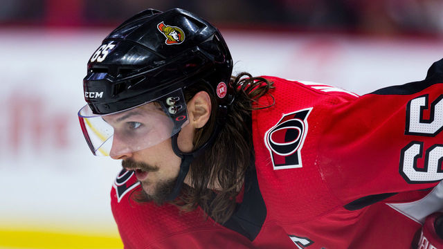 OTTAWA, ON - MARCH 29: Ottawa Senators Defenceman Erik Karlsson (65) prepares for a face-off during third period National Hockey League action between the Florida Panthers and Ottawa Senators on March 29, 2018, at Canadian Tire Centre in Ottawa, ON, Canada.
