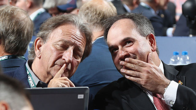 DALLAS, TX - JUNE 22: Eugene Melynk and Pierre Dorion of the Ottawa Senators attend the first round of the 2018 NHL Draft at American Airlines Center on June 22, 2018 in Dallas, Texas.