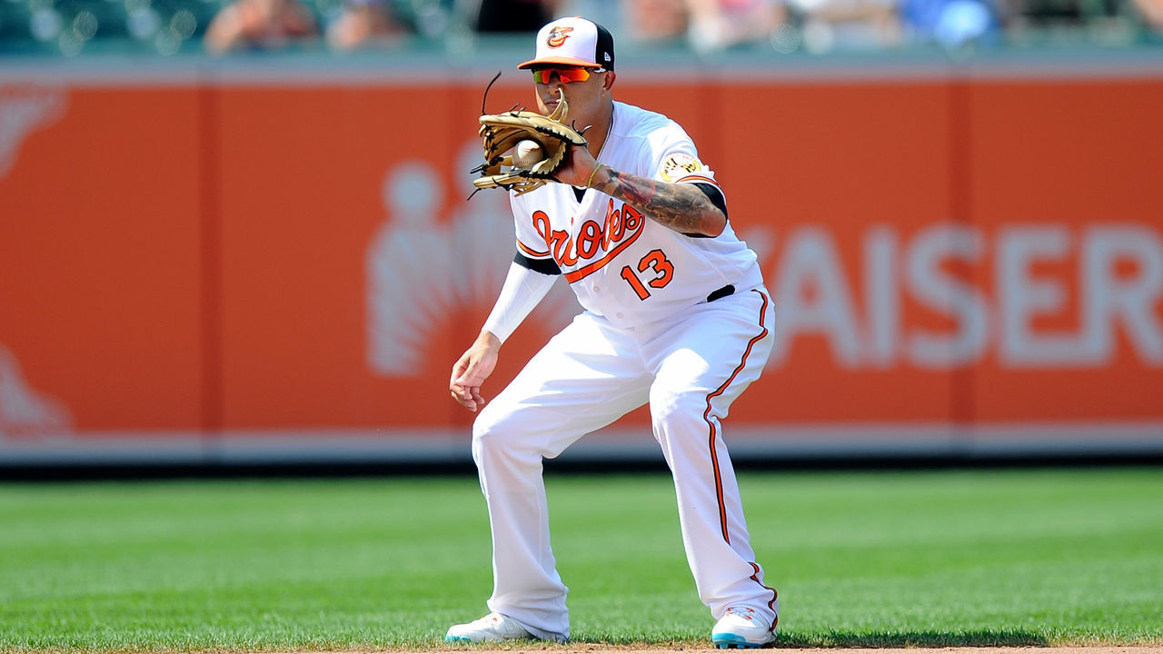 BALTIMORE, MD - JULY 01: Manny Machado #13 of the Baltimore Orioles catches a ball hit by Ian Kinsler #3 (not pictured) of the Los Angeles Angels to end the game in the ninth inning at Oriole Park at Camden Yards on July 1, 2018 in Baltimore, Maryland.