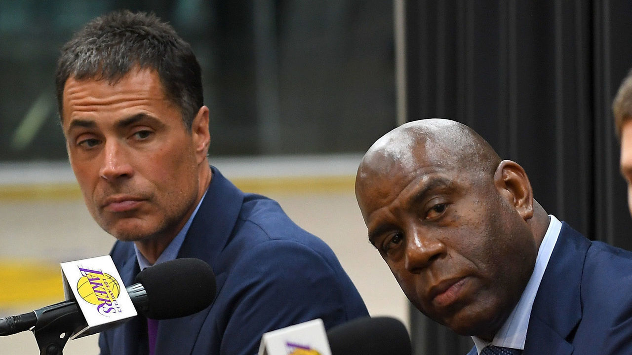 EL SEGUNDO, CA - JUNE 26: Sviatoslav Mykhailiuk #15 answers questions from the media as general manager Rob Pelinka, president of basketball operations Magic Johnson, and Moritz Wagner #9 of the Los Angeles Lakers listen during a press conference to introduce the 2018 draft picks, at the UCLA Health Training Center on June 26, 2018 in El Segundo, California. Wagner was chosen with the 25th overall pick and Mykhailiuk with the 47th pick. TO USER: User expressly acknowledges and agrees that, by downloading and/or using this Photograph, User is consenting to the terms and conditions of the Getty Images License Agreement.