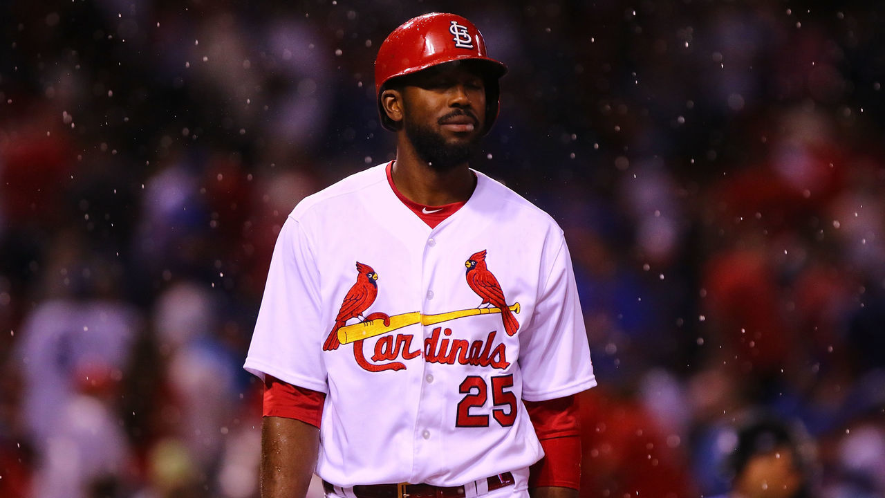 ST. LOUIS, MO - MAY 6: Dexter Fowler #25 of the St. Louis Cardinals returns to the dugout after a rain delay was called in the third inning during the game against the Chicago Cubs at Busch Stadium on May 6, 2018 in St. Louis, Missouri.