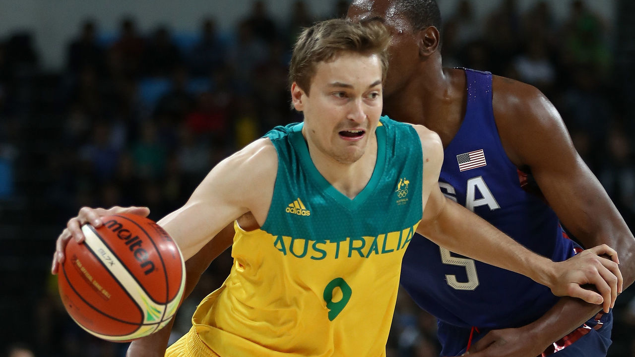RIO DE JANEIRO, BRAZIL - AUGUST 10: Ryan Broekhoff #9 of Australia moves the ball past Kevin Durant #5 of United States during a Preliminary Round Basketball game between Australia and the United States on Day 5 of the Rio 2016 Olympic Games at Carioca Arena 1 on August 10, 2016 in Rio de Janeiro, Brazil.