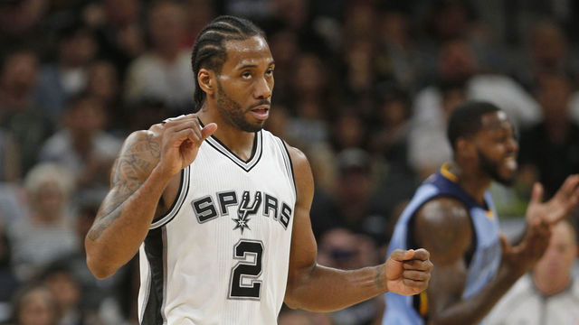 SAN ANTONIO,TX - APRIL 17 : Kawhi Leonard #2 of the San Antonio Spurs reacts after a basket against the Memphis Grizzlies in Game Two of the Western Conference Quarterfinals during the 2017 NBA Playoffs at AT&T Center on April 17, 2017 in San Antonio, Texas. NOTE TO USER: User expressly acknowledges and agrees that , by downloading and or using this photograph, User is consenting to the terms and conditions of the Getty Images License Agreement.