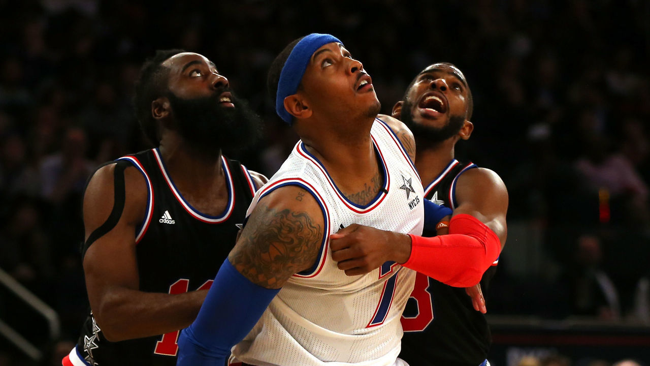 NEW YORK, NY - FEBRUARY 15: Carmelo Anthony #7 of the New York Knicks and the Eastern Conference looks on against James Harden #13 of the Houston Rockets and the Western Conference and Chris Paul #3 of the Los Angeles Clippers and the Western Conference during the 2015 NBA All-Star Game at Madison Square Garden on February 15, 2015 in New York City. NOTE TO USER: User expressly acknowledges and agrees that, by downloading and/or using this photograph, user is consenting to the terms and conditions of the Getty Images License Agreement.