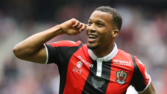 Nice's French forward Alassane Plea celebrates after scoring a goal during the French L1 football match Nice versus Rennes on April 8, 2018 at the Allianz Riviera Stadium in Nice, southeastern France. / AFP PHOTO / VALERY HACHE