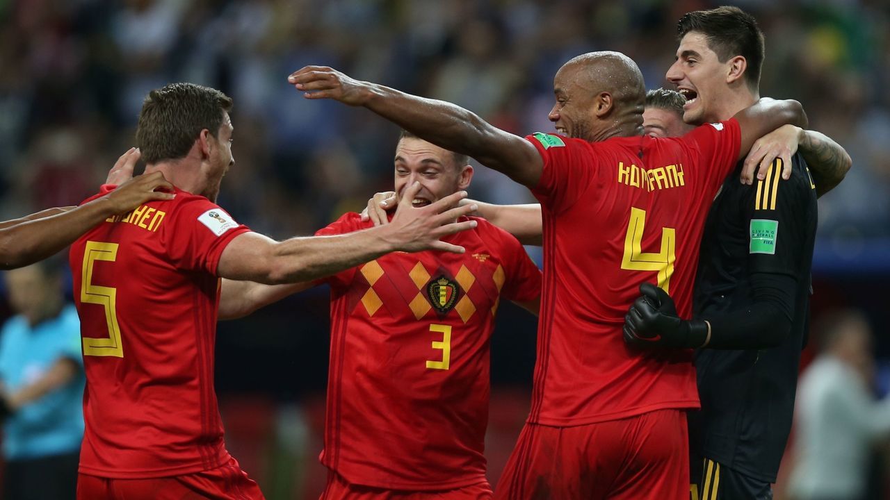 Belgium's players celebrate at the end of the Russia 2018 World Cup quarter-final football match between Brazil and Belgium at the Kazan Arena in Kazan on July 6, 2018.