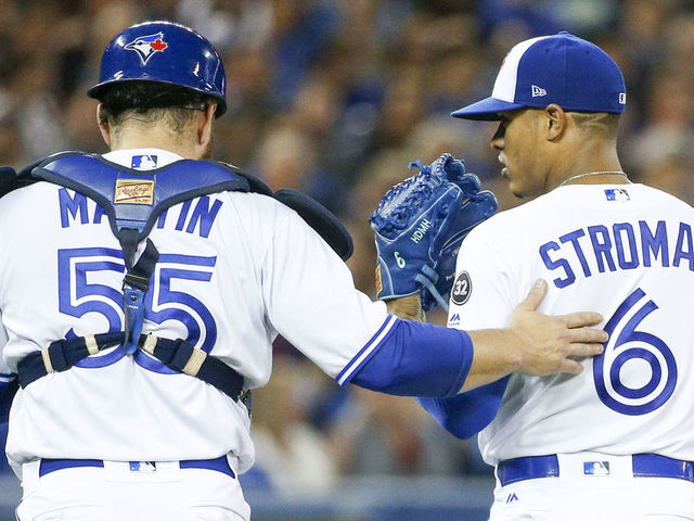 TORONTO, ON - MAY 8 - Blue Jays catcher Russell Martin chats with pitcher Marcus Stroman during the 5th inning of MLB action as the Toronto Blue Jays host the Seattle Mariners at the Rogers Centre on May 8, 2018. (Carlos Osorio/Toronto Star via Getty Images)
