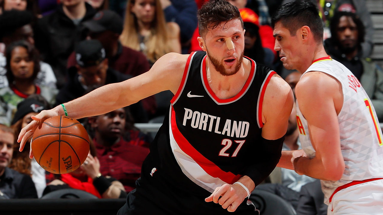 ATLANTA, GA - DECEMBER 30: Jusuf Nurkic #27 of the Portland Trail Blazers drives against Ersan Ilyasova #7 of the Atlanta Hawks at Philips Arena on December 30, 2017 in Atlanta, Georgia.