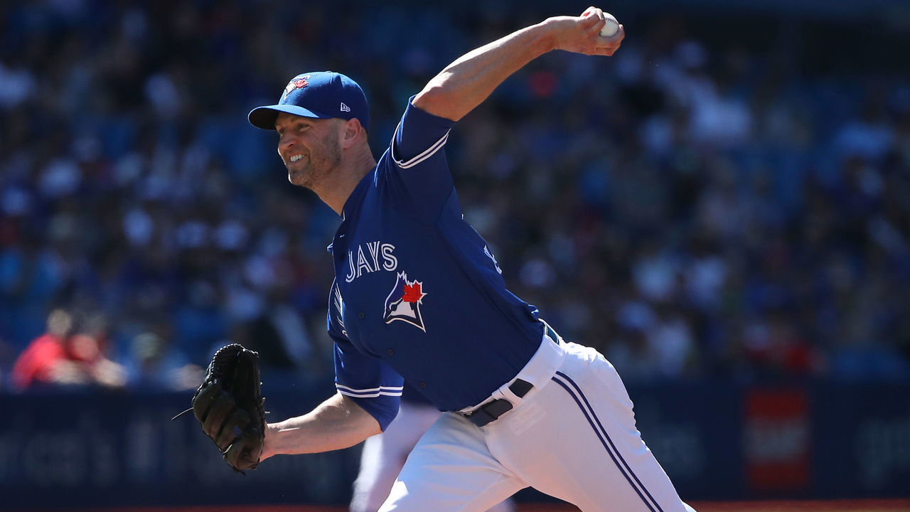 TORONTO, ON - JULY 7: J.A. Happ #33 of the Toronto Blue Jays delivers a pitch in the first inning during MLB game action against the New York Yankees at Rogers Centre on July 7, 2018 in Toronto, Canada.