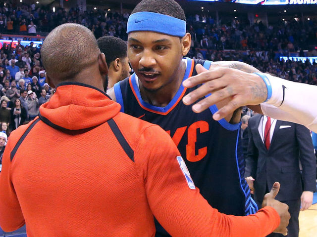 OKLAHOMA CITY, OK- DECEMBER 25: Carmelo Anthony #7 of the Oklahoma City Thunder and Chris Paul #3 of the Houston Rockets hug after the game on December 25, 2017 at Chesapeake Energy Arena in Oklahoma City, Oklahoma. Mandatory Copyright Notice: Copyright 2017 NBAE