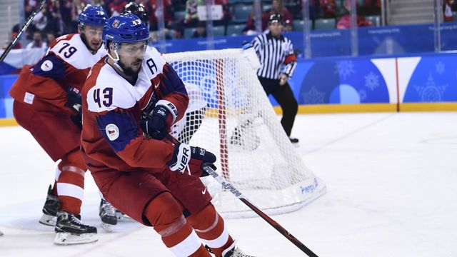 Czech Republic's Jan Kovar chases the puck in the men's bronze medal ice hockey match between the Czech Republic and Canada during the Pyeongchang 2018 Winter Olympic Games at the Gangneung Hockey Centre in Gangneung on February 24, 2018. / AFP PHOTO / Brendan Smialowski