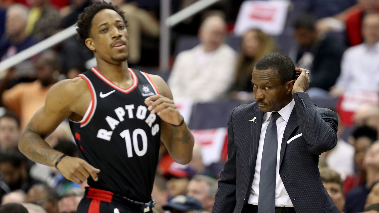 WASHINGTON, DC - APRIL 22: DeMar DeRozan #10 of the Toronto Raptors runs up the floor as head coach Dwane Casey looks on against the Washington Wizards during Game Four of Round One of the 2018 NBA Playoffs at Capital One Arena on April 22, 2018 in Washington, DC.