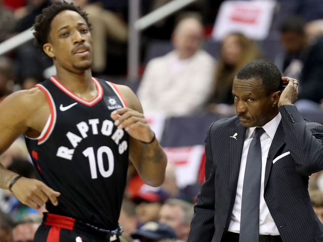 WASHINGTON, DC - APRIL 22: DeMar DeRozan #10 of the Toronto Raptors runs up the floor as head coach Dwane Casey looks on against the Washington Wizards during Game Four of Round One of the 2018 NBA Playoffs at Capital One Arena on April 22, 2018 in Washington, DC.