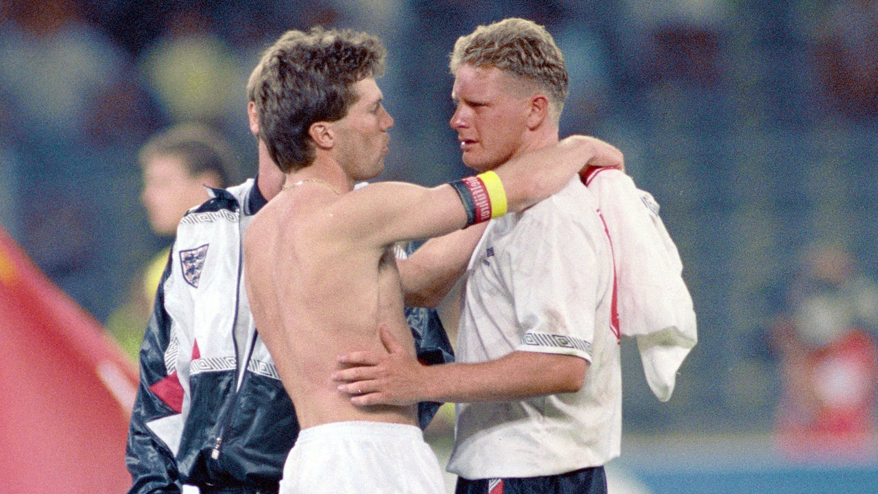 TURIN, ITALY - JULY 04: West Germany captain Lothar Matthaus consoles England player Paul Gascoigne after the 1990 FIFA World Cup semi final at the Stadio Delle Alpi on July 4, 1990 in Turin, Italy.
