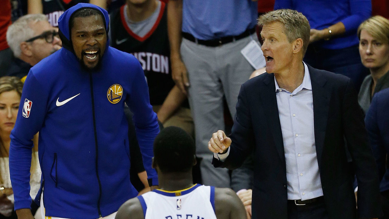 HOUSTON, TX - MAY 28: Head coach Steve Kerr, Kevin Durant #35 and Draymond Green #23 of the Golden State Warriors react in the fourth quarter of Game Seven of the Western Conference Finals of the 2018 NBA Playoffs against the Houston Rockets at Toyota Center on May 28, 2018 in Houston, Texas.