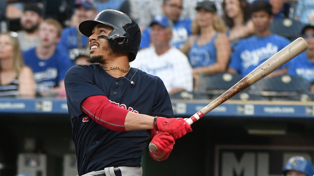 KANSAS CITY, MO - JULY 6: Mookie Betts #50 of the Boston Red Sox hits a home run in the first inning against the Kansas City Royals at Kauffman Stadium on July 6, 2018 in Kansas City, Missouri.