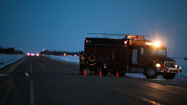 An emergency vehicle is seen near the crash site on April 6, 2018 after a bus carrying a junior ice hockey team collided with a semi-trailer truck between Tisdale and Nipawin, Saskatchewan province, killing 14 people. - Hockey-mad Canada was in mourning on Saturday after a bus carrying a junior ice hockey team collided with a semi-trailer truck in Saskatchewan province, killing 14 people.In a country where love of the sport is almost a religion, the crash sparked an outpouring of grief among players and fans on social media, while national political leaders expressed their sympathies.'We can now confirm 14 people have died as a result of this collision,' the Royal Canadian Mounted Police said in a statement, which did not say how many of the victims were players or coaches of the Humboldt Broncos team.