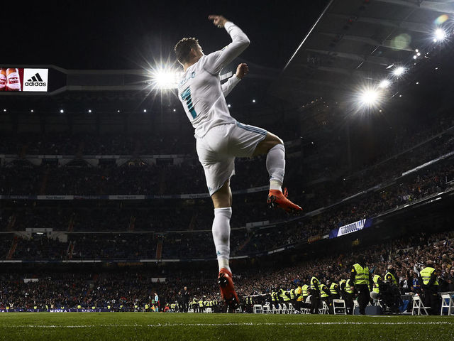 MADRID, SPAIN - MARCH 18: Cristiano Ronaldo of Real Madrid CF celebrates scoring their second goal during the La Liga match between Real Madrid CF and Girona FC at Estadio Santiago Bernabeu on March 18, 2018 in Madrid, Spain.