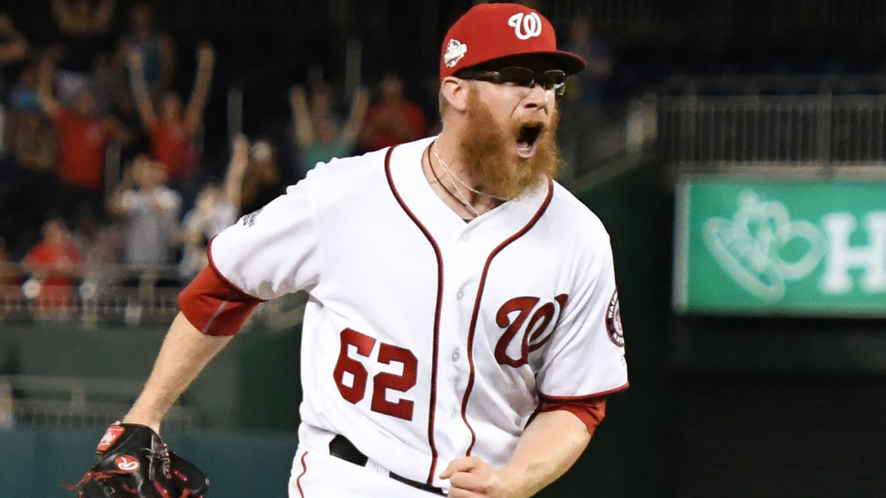 WASHINGTON, DC - JULY 05: Sean Doolittle #62 of the Washington Nationals celebrates a win over the Miami Marlins at Nationals Park on July 5, 2018 in Washington, DC.