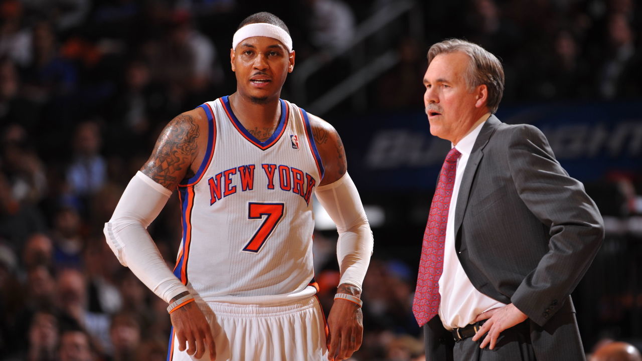 NEW YORK - JANUARY 11: Carmelo Anthony #7 of the New York Knicks talks to head coach Mike D'Antoni during the game against the Philadelphia 76ers on January 11, 2012 at Madison Square Garden in New York, New York. NOTE TO USER: User expressly acknowledges and agrees that, by downloading and/or using this Photograph, user is consenting to the terms and conditions of the Getty Images License Agreement. Mandatory Copyright Notice: Copyright 2012 NBAE