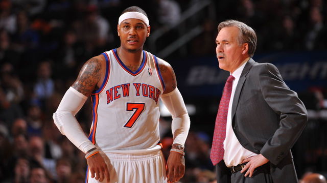 NEW YORK - JANUARY 11: Carmelo Anthony #7 of the New York Knicks talks to head coach Mike D'Antoni during the game against the Philadelphia 76ers on January 11, 2012 at Madison Square Garden in New York, New York. NOTE TO USER: User expressly acknowledges and agrees that, by downloading and/or using this Photograph, user is consenting to the terms and conditions of the Getty Images License Agreement. Mandatory Copyright Notice: Copyright 2012 NBAE