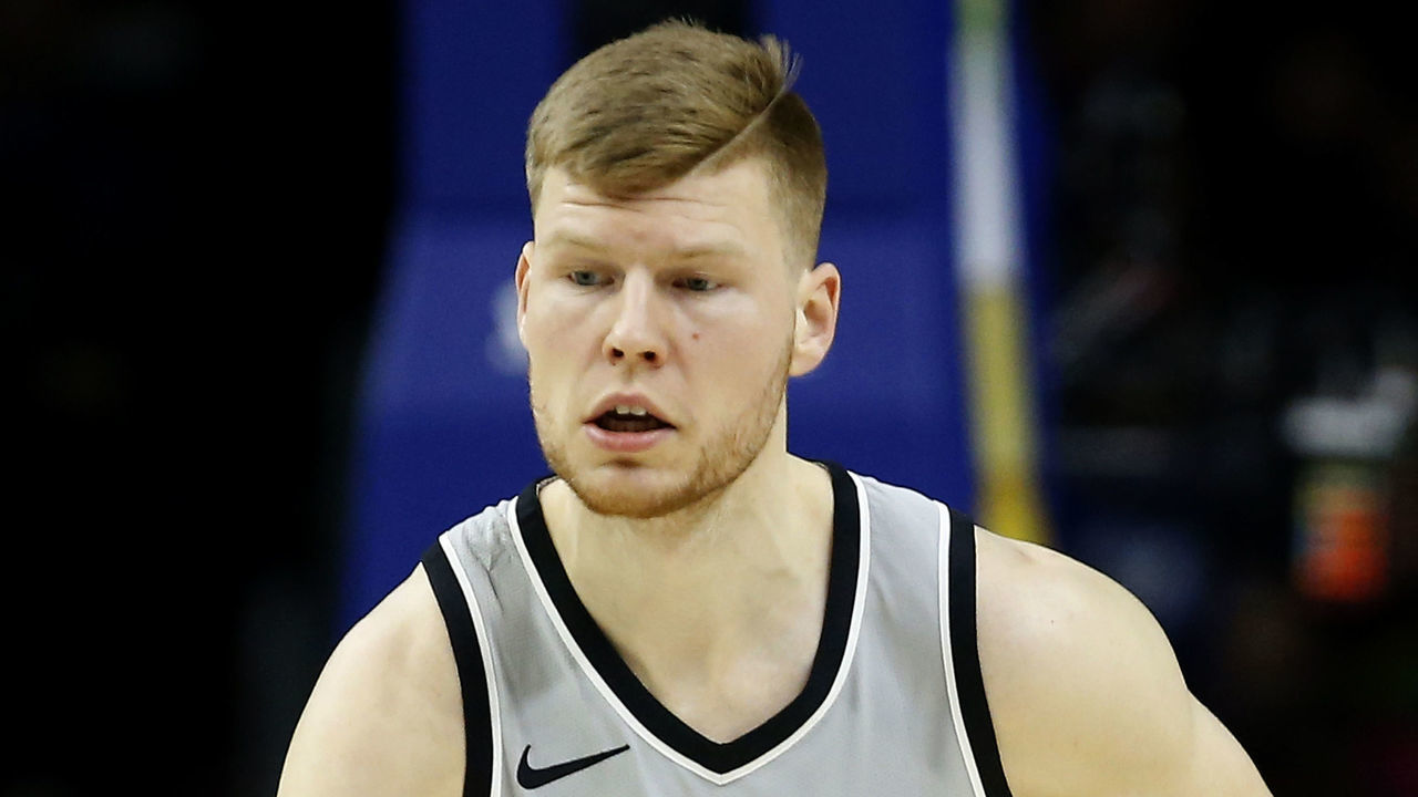 PHILADELPHIA, PA - JANUARY 3: Davis Bertans #42 of the San Antonio Spurs dribbles the ball against the Philadelphia 76ers in the first half at Wells Fargo Center on January 3, 2018 in Philadelphia, Pennsylvania.
