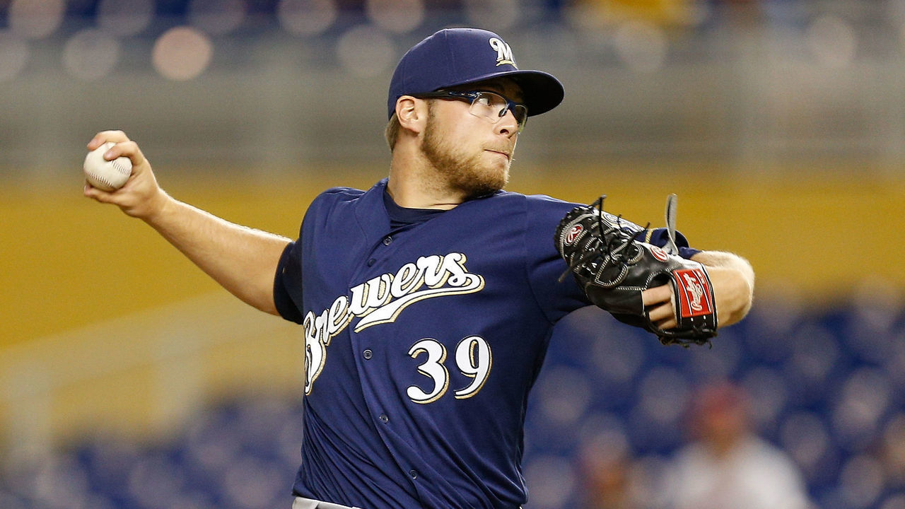 MIAMI, FL - JULY 10: Corbin Burnes #39 of the Milwaukee Brewers delivers a pitch in the eighth inning against the Miami Marlins at Marlins Park on July 10, 2018 in Miami, Florida.