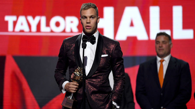 LAS VEGAS, NV - JUNE 20: Taylor Hall of the New Jersey Devils accepts the Hart Trophy, given to the most valuable player to his team, onstage at the 2018 NHL Awards presented by Hulu at The Joint inside the Hard Rock Hotel & Casino on June 20, 2018 in Las Vegas, Nevada.