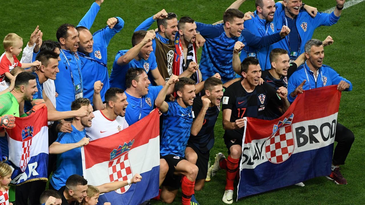 Croatia's players celebrate after winning the Russia 2018 World Cup semi-final football match between Croatia and England at the Luzhniki Stadium in Moscow on July 11, 2018.
