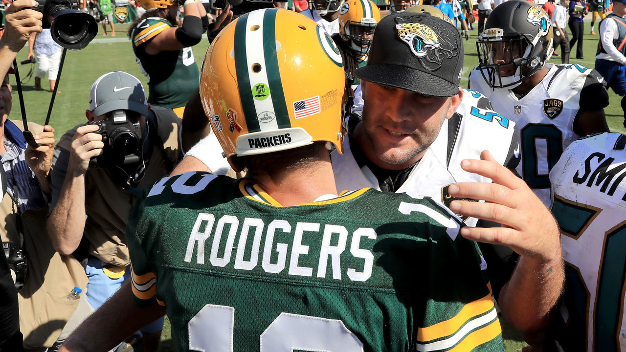 JACKSONVILLE, FL - SEPTEMBER 11: AAron Rodgers #12 of the Green Bay Packers hugs Blake Bortles #5 of the Jacksonville Jaguars at the end of their game at EverBank Field on September 11, 2016 in Jacksonville, Florida.