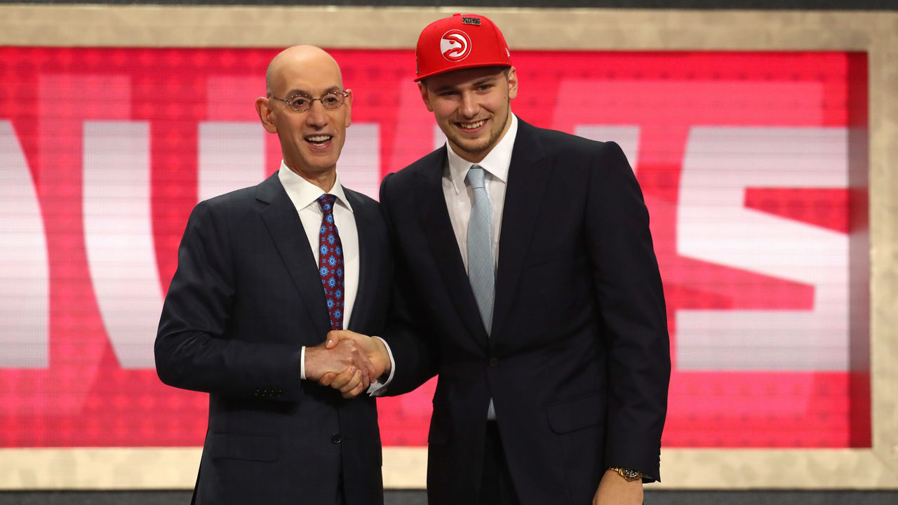 NEW YORK, NY - JUNE 21: Luka Doncic poses with NBA Commissioner Adam Silver after being drafted third overall by the Atlanta Hawks during the 2018 NBA Draft at the Barclays Center on June 21, 2018 in the Brooklyn borough of New York City.